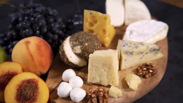 Cheese Plate Served with Grapes and Nuts