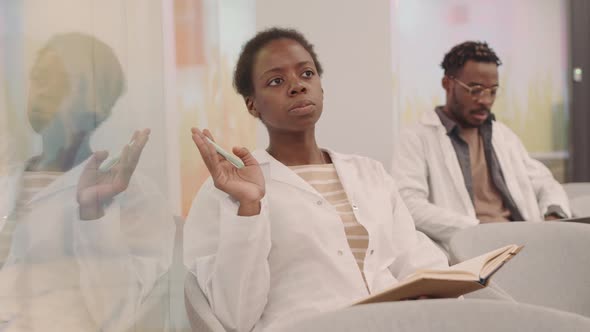 Afro American Female Medical Student at Lecture alt