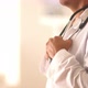 Close up of Hispanic doctor&#39;s hands holding stethoscope - VideoHive Item for Sale