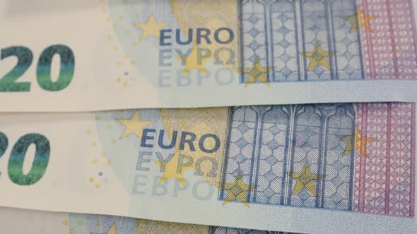 Paper Euro twenty denominations money in a row close-up 4K 2160p 30fps UHD tilting footage - Europea alt