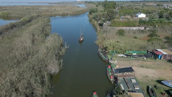 Forward Moving Aerial Drone Footage of of a Boat with Tourists on It to Visit the Natural Park of alt