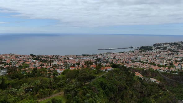 Drone view of Funchal city and Monte hill on Madeira island, Portugal alt