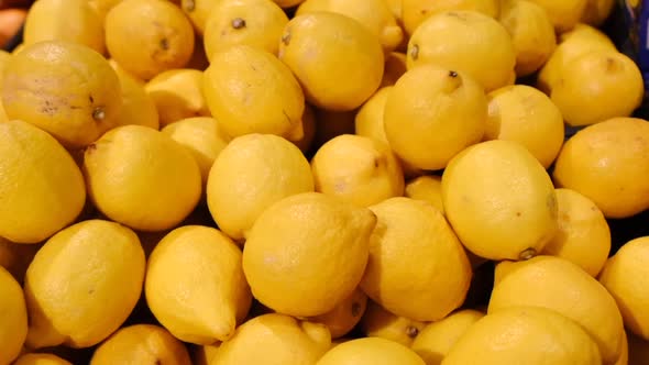 Lots of Lemons in the Fruit Market Organic Food for Vegetarians alt