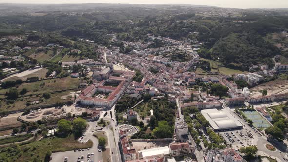 Wide panoramic view of Alcobaça, Portugal. Medieval Monastery and picturesque cityscape alt