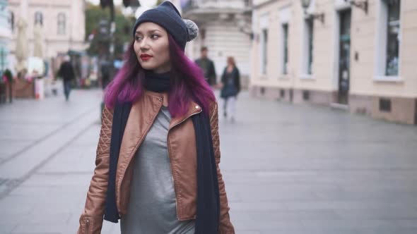 Hipster Girl Tourist During Her Vacation Exploring the Old Town Center alt