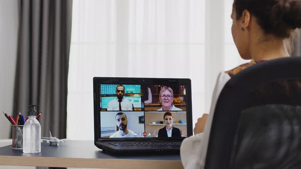 Female Freelancer in a Video Conference alt