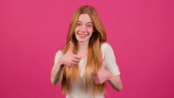 Young Redhead Woman with Freckles Doing Happy Thumbs Up Gesture with Hands alt