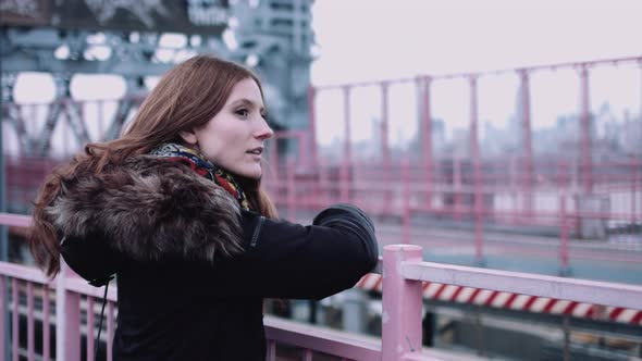 Young adult woman on looking at skyline in New York