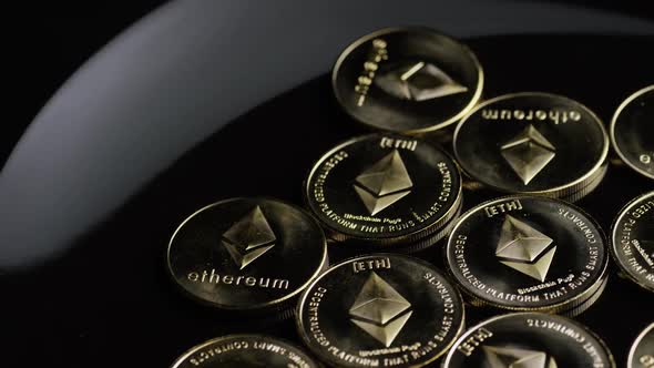 Rotating shot of Bitcoins (digital cryptocurrency) - BITCOIN ETHEREUM 112 alt