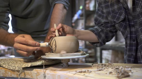 Making a Handmade Clay Pot in the Workshop. Pottery Lesson with Master. alt