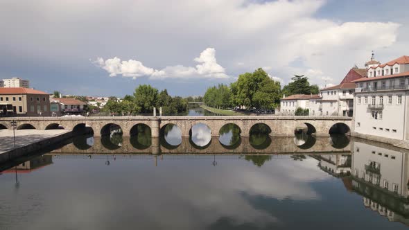 Aerial view of Trajano bridge crossing Tamega river of Chaves city in Portugal alt