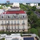 Aerial slide to the right showing the Paseo de Montejo with the Casa Gemalas, twin mansions in Merid - VideoHive Item for Sale
