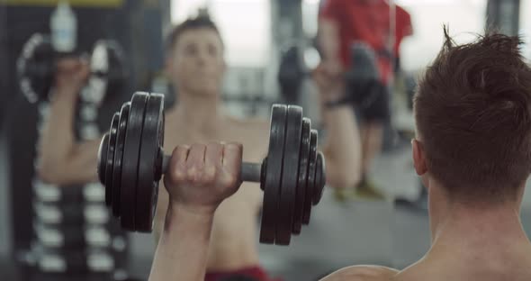 Man Doing Biceps Lifting Barbell