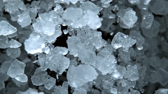 Super Slow Motion Shot of Exploding Crushed Ice Towards Camera at 1000Fps. alt