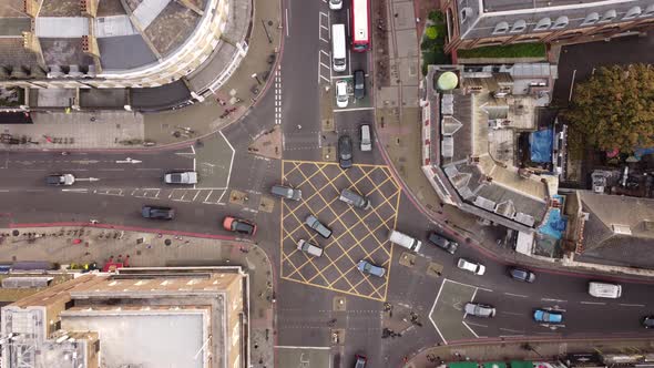 A Drone View From Above of a Busy Intersection with Different Traffic Flows alt
