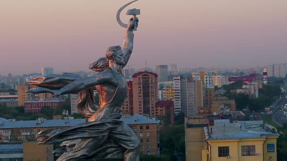 A Soviet Sculpture with Skyscrapers in the Background alt