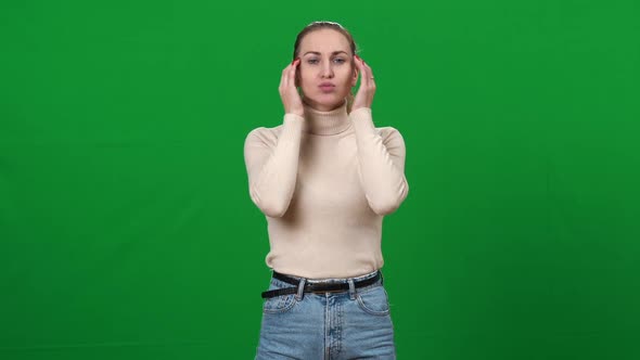 Confident Professional Actress Making Articulation Warmup at Chromakey Background alt