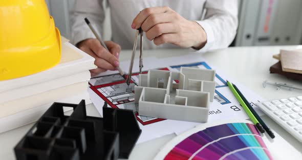 Woman Architect Developing Design Project of Apartments on Drawing Using Compass Closeup  Movie alt