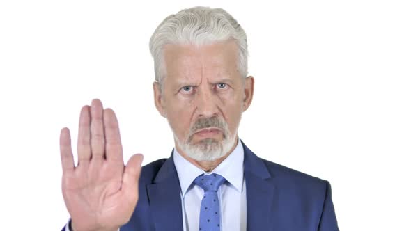 Stop Gesture By Old Businessman Isolated on White Background alt