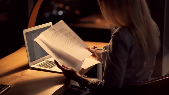Overworked Tired Businesswoman Working Late Night At Deadline. Woman Worker Office At Night. alt