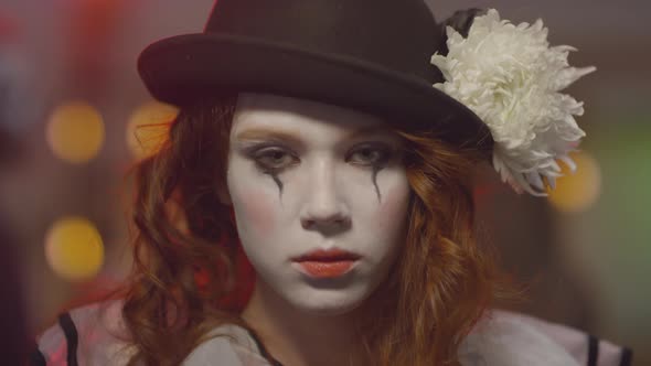 Woman in Sad Clown Halloween Costume alt