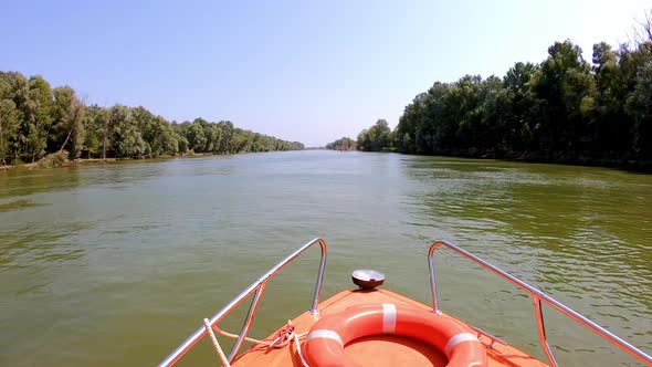 High Speed Boat Navigating in the Sfantu Gheorghe arm of Danube River, Romania alt