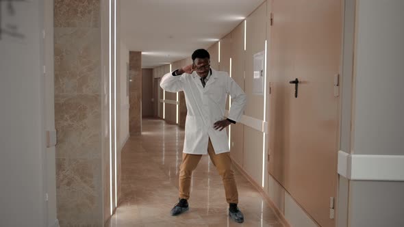 Doctor Therapist Afro American Dances Celebrating the Victory Over the Coronavirus alt