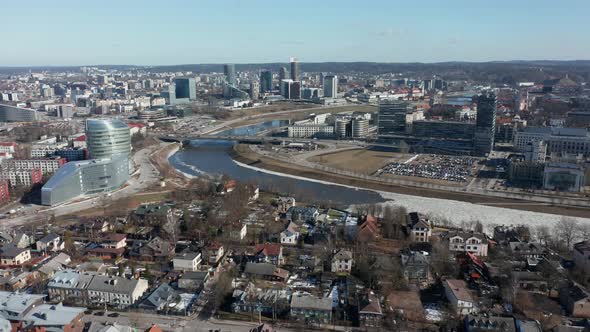AERIAL: Vilnius From Air with New Office Buildings and Old Private Houses near River Neris