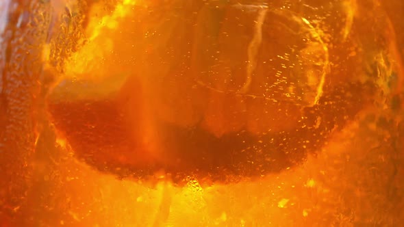 Refreshing orange drink in the sun - 180fps alt