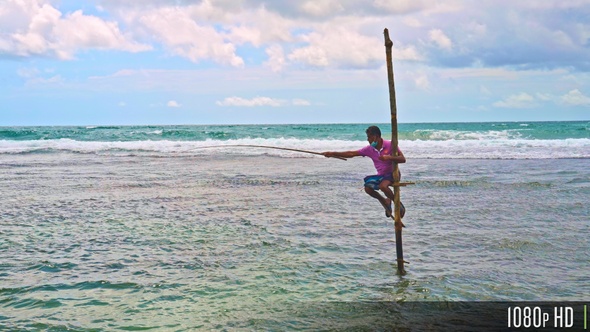 Sri Lankan Stilt Fisherman During the Day with Seascape Ocean View alt
