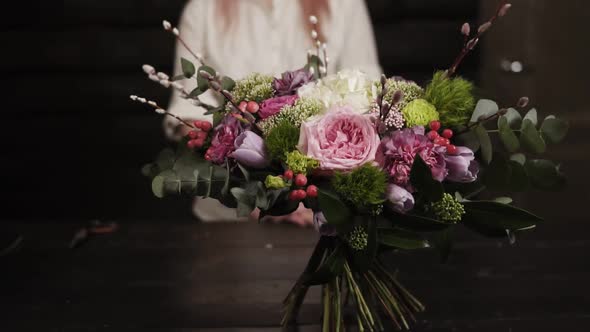 A Survey Slowmotion Footage of an Amazing Bouquet of Flowers Arranged By a Florist alt