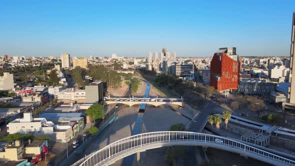 Aerial establishing shot, drone flyover Puente Ramón Bautista Mestre and Puente Centenario along Suq alt