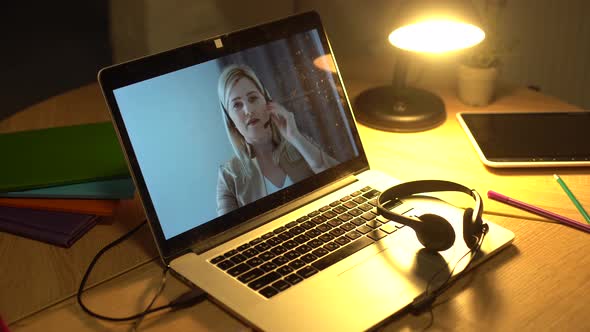 Businesswoman Using Laptop Making Video Call Conference with Colleagues and Talking Discussing