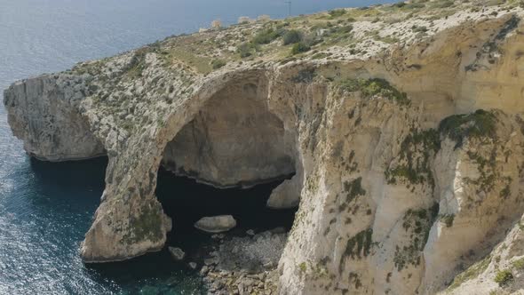 Fantastic view over the Blue Grotto, a complex of sea caves along the Southeastern part of Malta alt