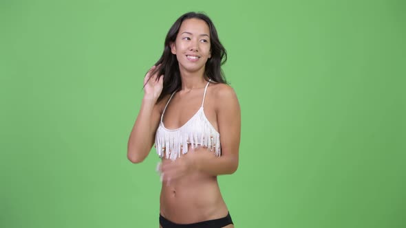 Young Happy Beautiful Multiethnic Woman Wearing Bikini Ready for Vacation
