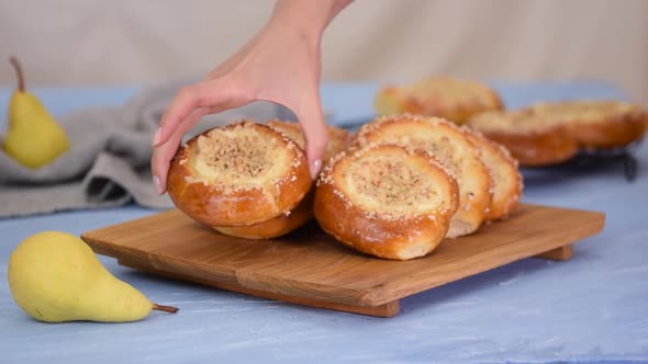 Freshly Baked Sweet Cheese Filled Buns With Pears