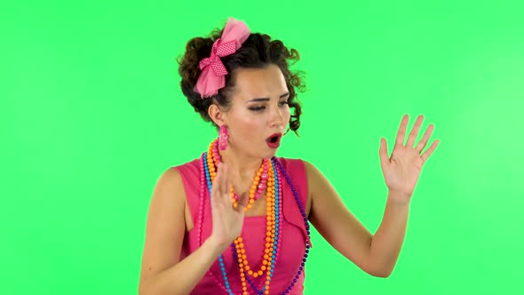 Girl Is Shocked and Surprised at What Is Happening Around, Looking with Delight and Admiration alt