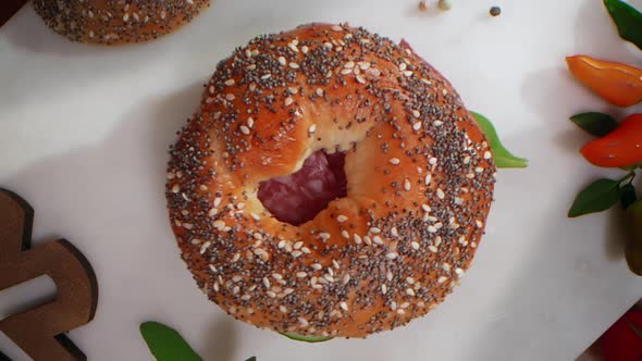 Video of the Top of the Bagel Falls in Slow Motion Flat Lay Tabletop Food Cooking