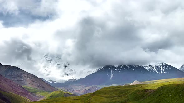 Beautiful View of the Pamir Mountains. Time Lapse. Base Camp of Lenin Peak. Kyrgyzstan. alt