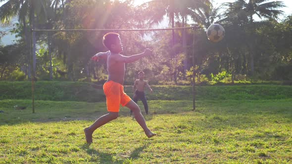 Rural Soccer Player's Kicking  alt