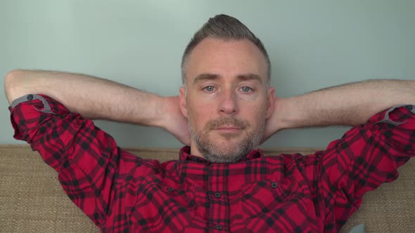 Bearded Man is Annoyed by What he Sees on TV alt