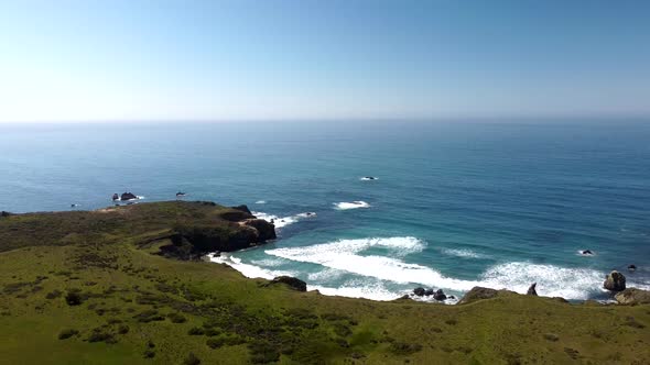 Zoom out of beach on California central coast. 4k 24fps alt