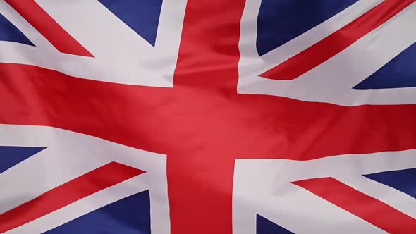 Background of UK flag waving in the wind alt