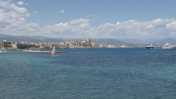 ANTIBES, FRANCE - JULY 2017   French Alps in background  near fortified city alt