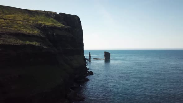 Aerial View of a Rock Formation Risin Og Kellingin in Faroe Islands alt