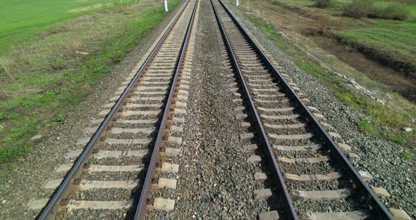 Empty Railroad Tracks in Sunny Weather