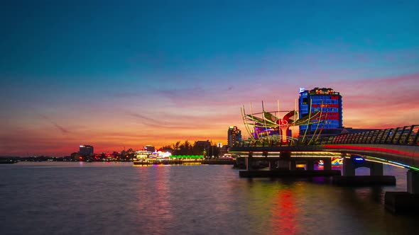 Time lapse: Vietnam Can Tho city skyline boats on Mekong River, pedestrian walkaway waterfront alt