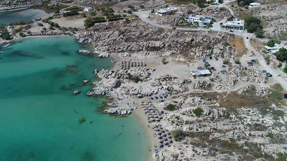 Piperi beach in Naoussa on Paros island in the Cyclades in Greece aerial view alt