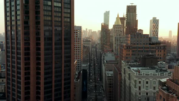 Fly Above Wide and Busy Park Avenue Surrounded By High Rise Buildings alt