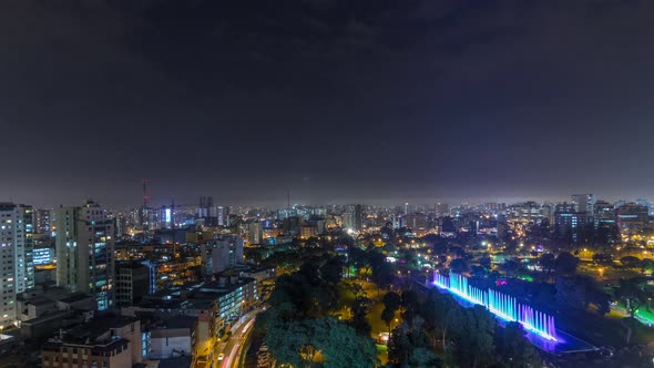 Aerial View to Park of the Reserve with Colorful Magic Water Circuit Biggest Fountain Complex Night alt